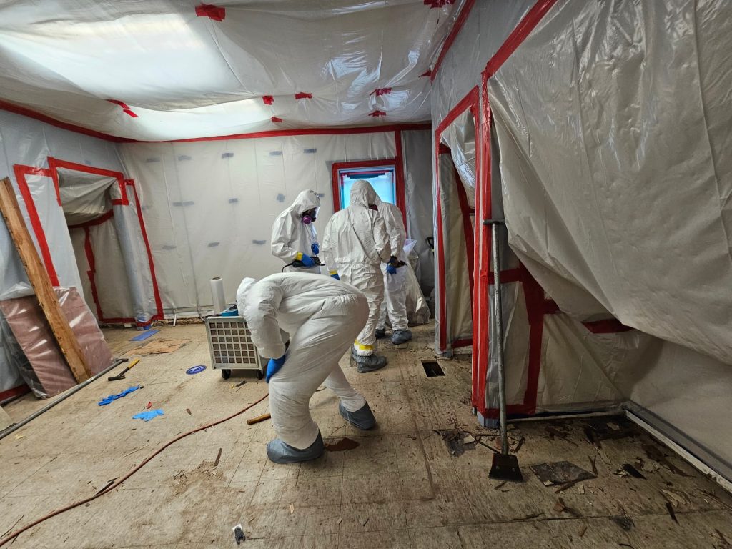 Asbestos abatement containment barriers and negative air setup